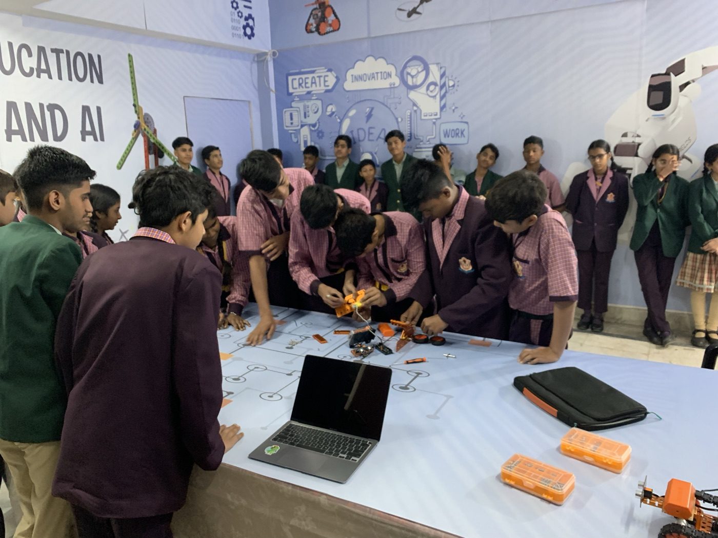 Students building a robot